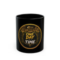 Black 11 oz Bee Sober ceramic mug with gold One Day at a Time artwork, front view