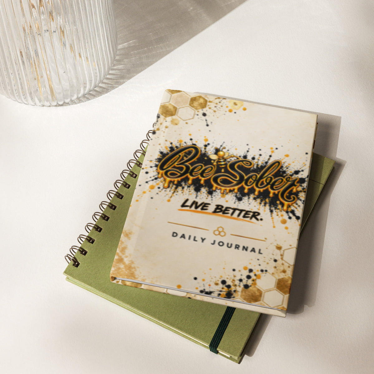 Bee Sober Live Better daily journal shown on a desk